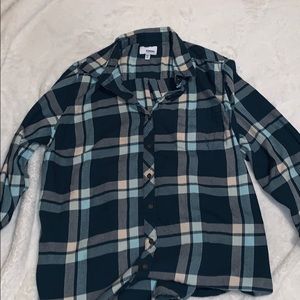 Woman’s blue and white flannel